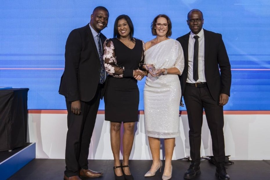 Best Paper Award Winner Eleanor Red Louw with SAPICS directors Jonathan Mphake, Regina Naicker (left) and SAPICS president Thato Moloi (right). Supplied by SAPICS